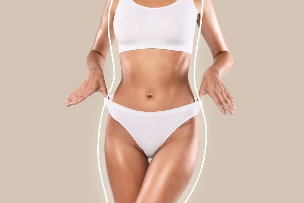 A close-up shot of a woman’s torso after liposuction in Chicago